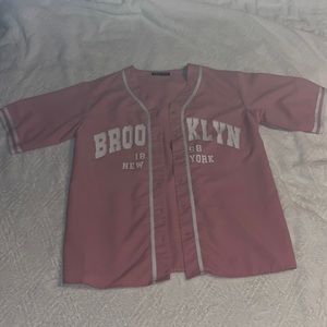 Size XS, oversized ‘BROOKLYN’ baseball jersey, in perfect condition, rarely worn